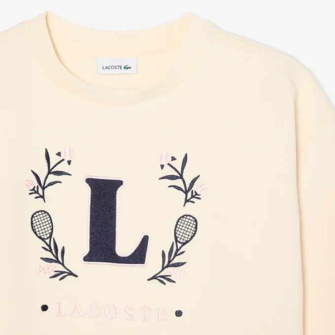 Sweats en néoprène avec écusson brodé Sweats en néoprène avec écusson brodé