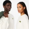 Sweats unisexes amples en molleton avec écusson Sweats unisexes amples en molleton avec écusson