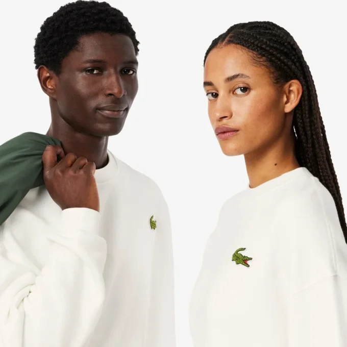 Sweats unisexes amples en molleton avec écusson Sweats unisexes amples en molleton avec écusson