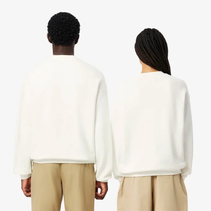 Sweats unisexes amples en molleton avec écusson Sweats unisexes amples en molleton avec écusson