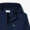 Veste coupe-vent à capuche unisexe