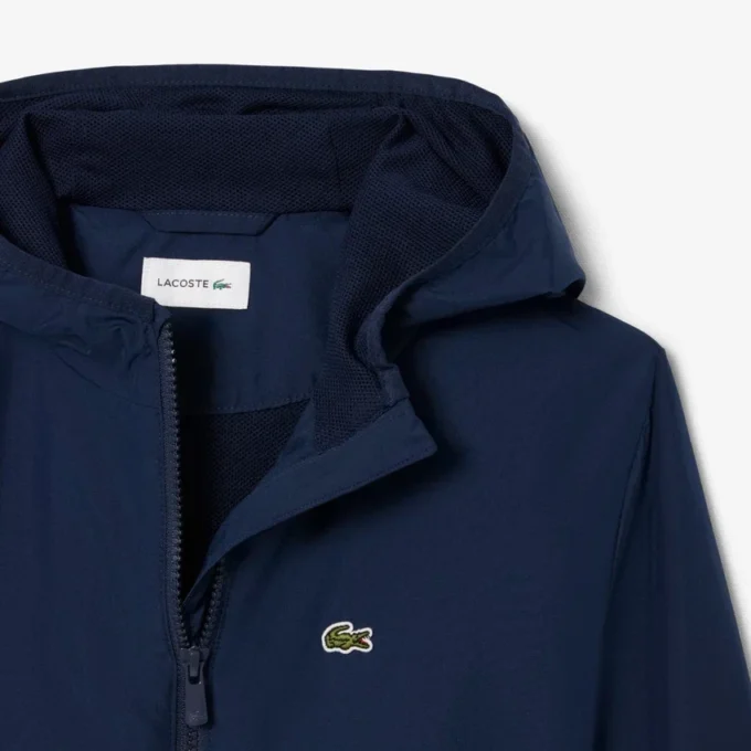 Veste coupe-vent à capuche unisexe