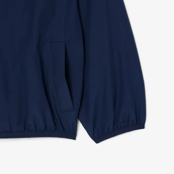 Veste coupe-vent à capuche unisexe