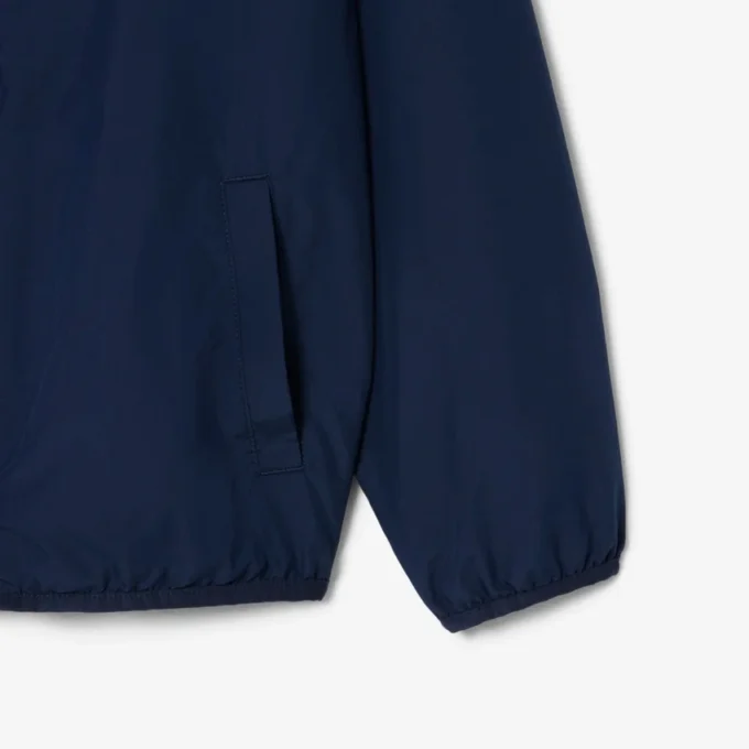 Veste coupe-vent à capuche unisexe
